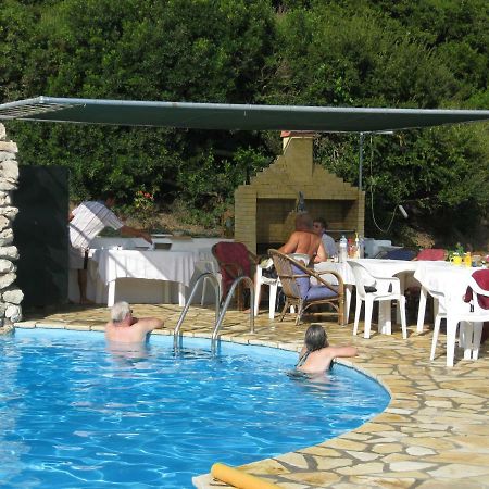 Angela Apartments Pool Gardens And Sea Views Агиос Стефанос Экстерьер фото