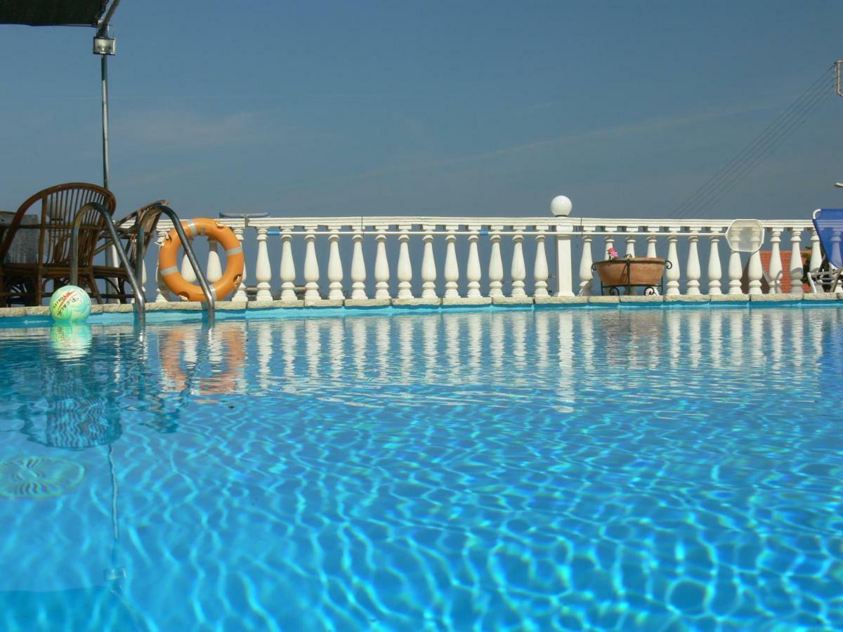 Angela Apartments Pool Gardens And Sea Views Агиос Стефанос Экстерьер фото